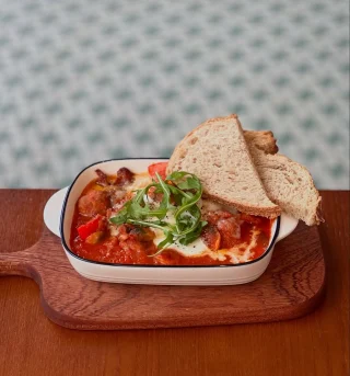 Image 11: Loaded. Saucy. Satisfying. Pork meatballs, bacon, cheese & more — this one brings the heat.🔥 #fuelx #refuelcafe #fuelmeup #brunch #brunchtime